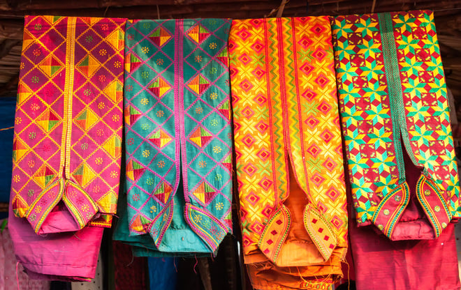 colorful kurta mens shirt at a market, India